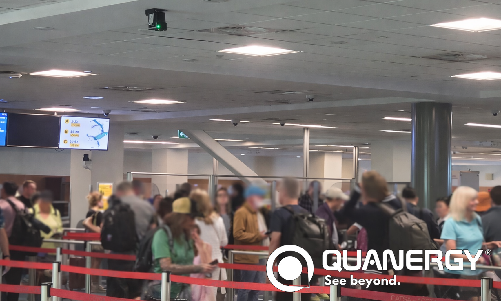 Passengers queue at Vancouver International Airport security checkpoint using LiDAR-based passenger flow monitoring to measure wait times and congestion