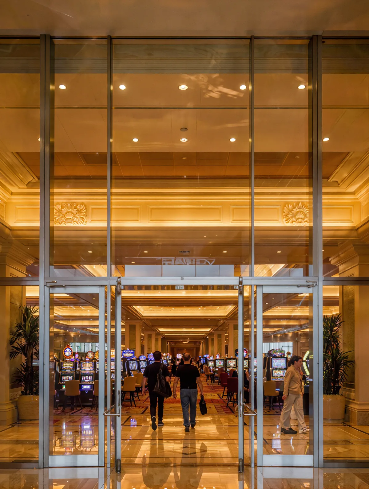 Casino resort entrance lobby with guests walking in
